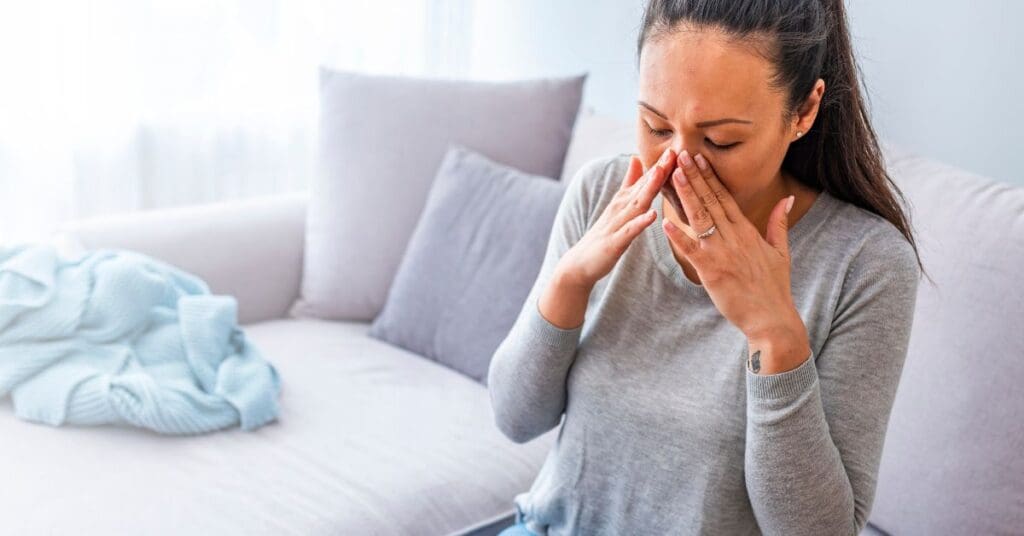 woman with sinus headache needs natural respiratory support.